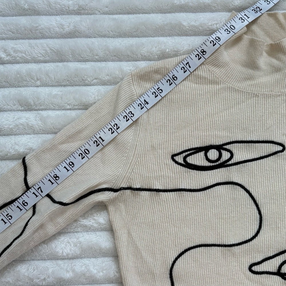 AKIRA Willa Abstract Face Ribbed Turtleneck Sweater Medium Cream Artsy - Picture 9 of 9
